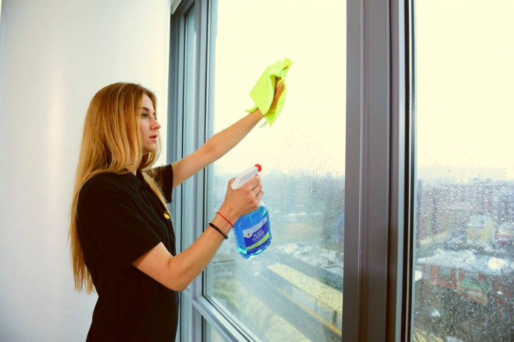 sunlight house cleaning services NYC - our cleaner wash windows after post construction